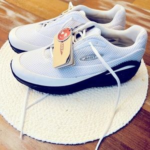 Swiss engineered, never used, size 8-8.5 US MBT sneakers.